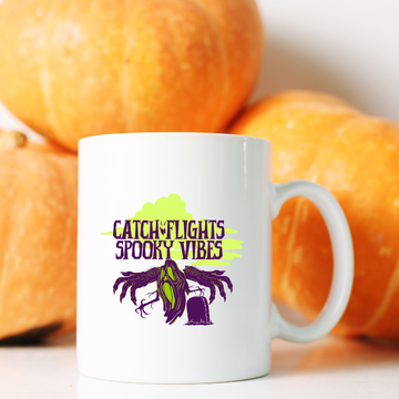 Catch Flights & Spooky Vibes – the perfect adventurous mug for travel and Halloween lovers.