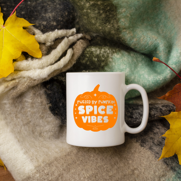 Fueled by Pumpkin Spice Vibes – the perfect autumn mug for seasonal coffee lovers.