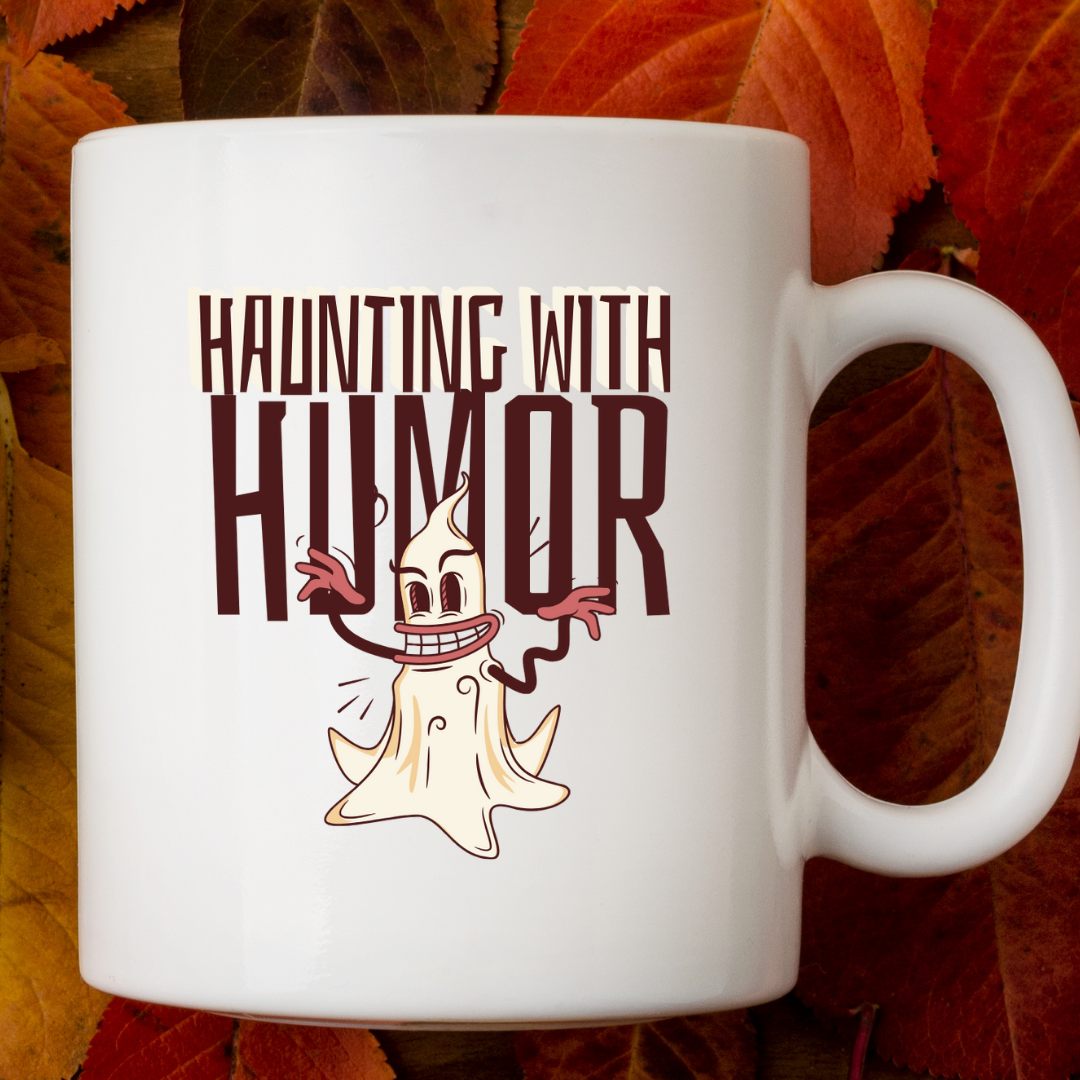 Haunting With Humor – the perfect playful mug for spooky comedy fans and coffee lovers.