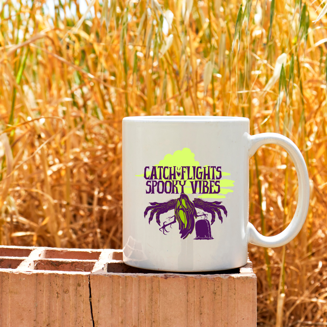Catch Flights & Spooky Vibes – the perfect adventurous mug for travel and Halloween lovers.