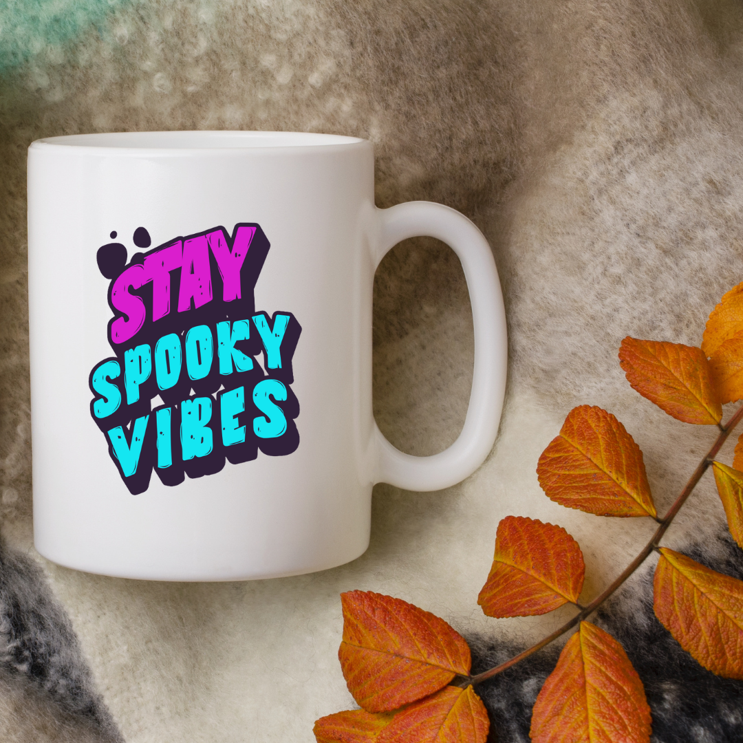 Stay Spooky Vibes – the perfect haunting mug for year-round Halloween lovers and coffee enthusiasts.