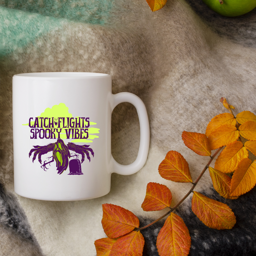 Catch Flights & Spooky Vibes – the perfect adventurous mug for travel and Halloween lovers.