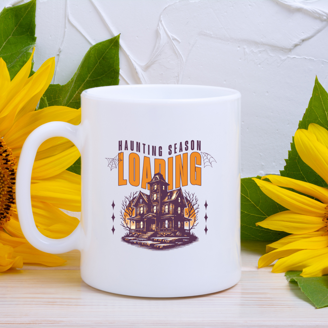 Haunting Season Loading – the perfect anticipatory mug for Halloween lovers and coffee enthusiasts.